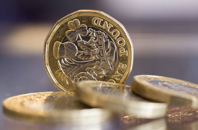 Close-up of coins on table