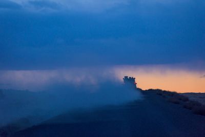 Scenic view of landscape against sky during sunset