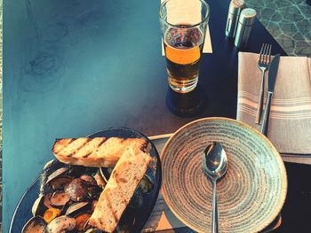 High angle view of beer in glass on table