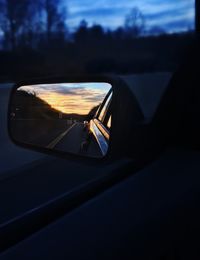 Cropped image of car on road