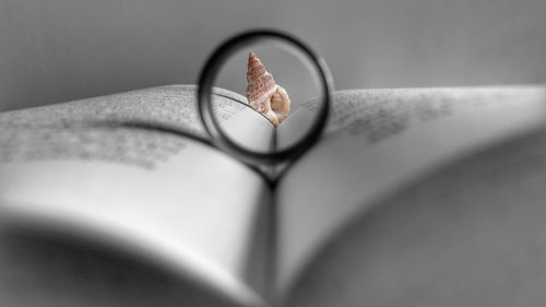 Close-up of eyeglasses on book