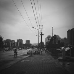 View of city against cloudy sky