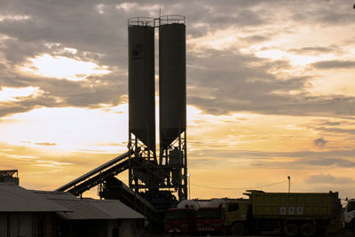 Low angle view of building against sky during sunset