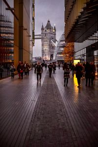 People walking on street in city