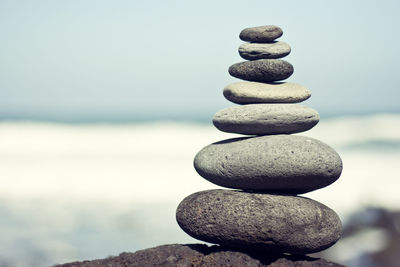 Close-up of stone stack on rock