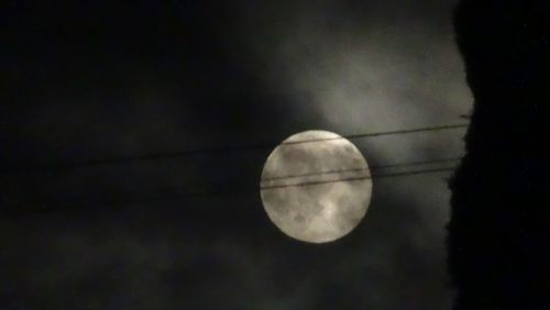 Low angle view of moon in sky