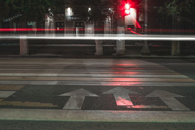 Light trails on street in city at night