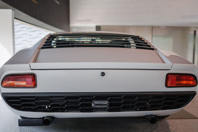 White lamborghini miura, classic vintage italian quality car - rear view.