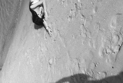 Low section of woman on beach