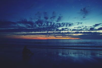 Scenic view of sea at sunset