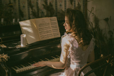 Woman playing at music concert