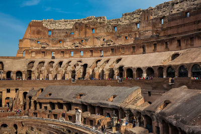 View of the seating areas and the hypogeum of the ancient colosseum in rome