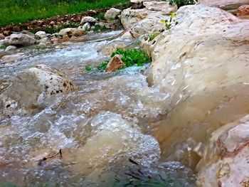 Stream flowing through rocks