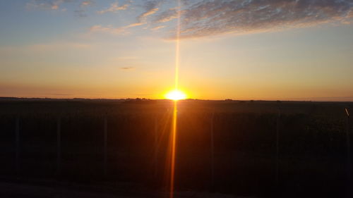 Sun shining through clouds