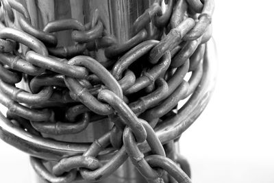 Close-up of chain against white background