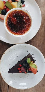 High angle view of fruits in plate on table