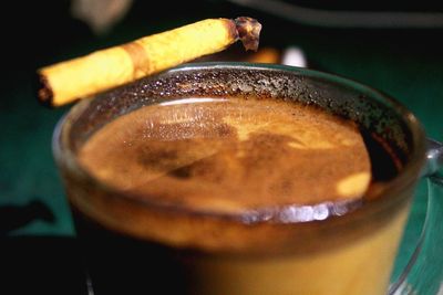 Close-up of coffee cup on table