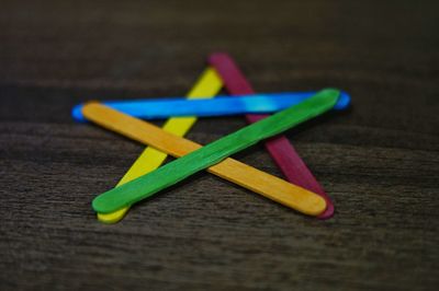 Close-up of multi colored pencils on table