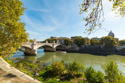 Bridge over river against sky