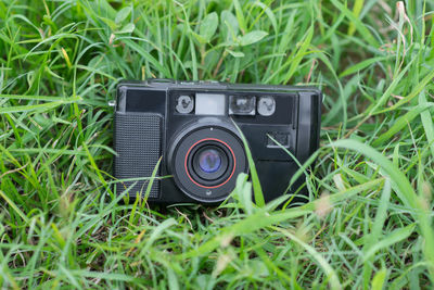 Close-up of camera on field