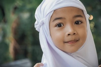 Close-up portrait of smiling boy