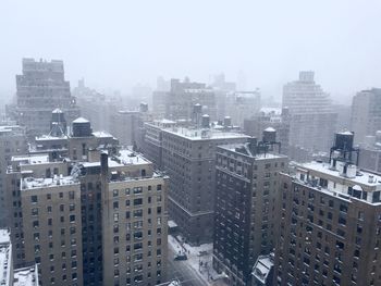 Cityscape against sky during winter