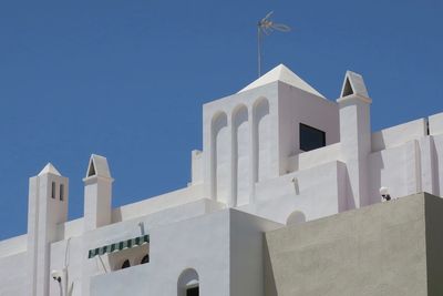 Low angle view of cathedral against clear blue sky