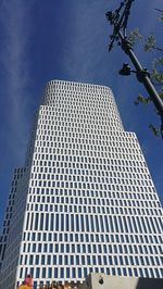 Low angle view of modern building against sky