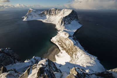 Scenic view of sea against sky during winter over the arctic circle in norway