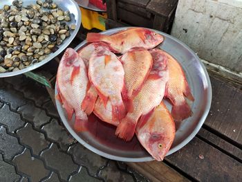 High angle view of seafood in container on table