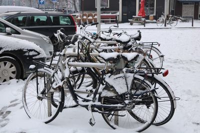 Close-up of bicycle parked in city