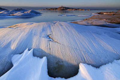 Frozen rocks and ice, stora amundön, gothenburg, sweden, europe