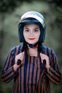 Portrait of cute girl standing outdoors