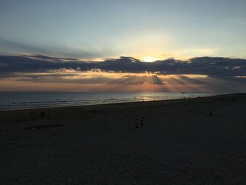 Silhouette of people on beach