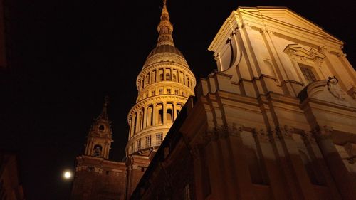 Low angle view of illuminated temple at night