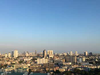 Cityscape against clear sky