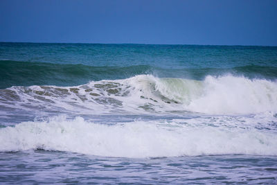 Scenic view of sea against clear sky