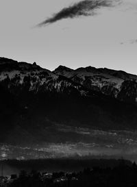 Scenic view of silhouette mountains against sky