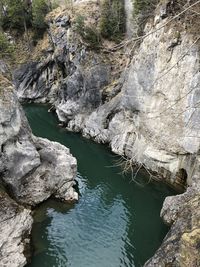 High angle view of rocks in river