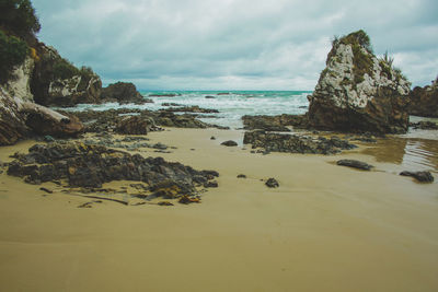 Scenic view of beach against sky