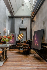 Empty chairs and table in room