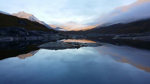 Reflection of mountain range in water