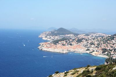 Scenic view of sea against blue sky