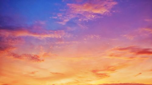 Low angle view of orange cloudy sky