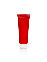 Red drink against white background