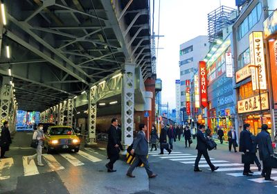 People walking on city street