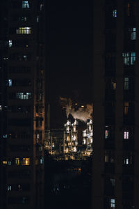 Illuminated buildings in city at night