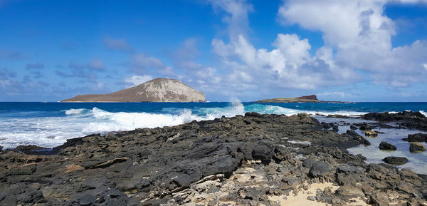 Panoramic view of beach against sky