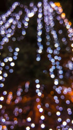 Defocused image of illuminated christmas lights