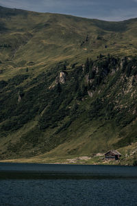 Scenic view of lake by mountain